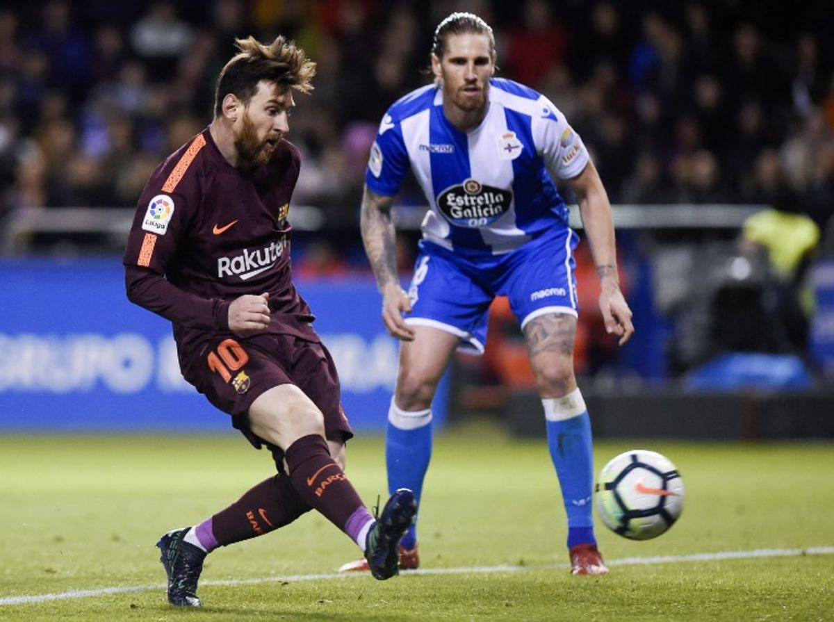 Messi y Suárez le dan el título al Barcelona en España