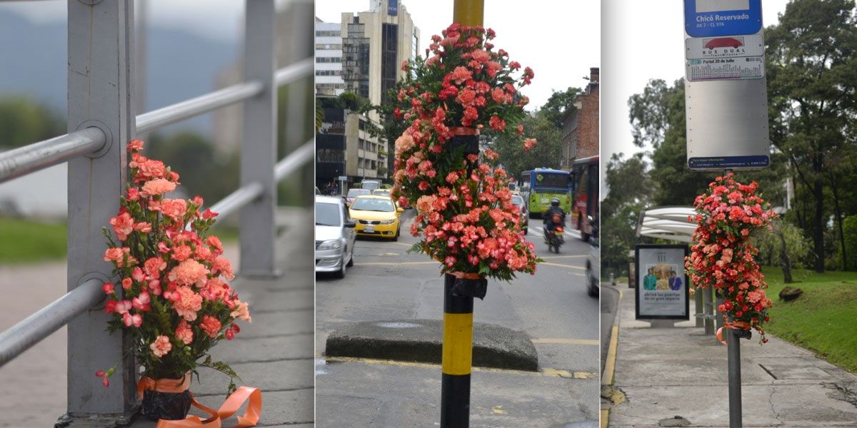 ¿Por qué Bogotá amaneció con arreglos florales colgados en postes, semáforos y puentes?