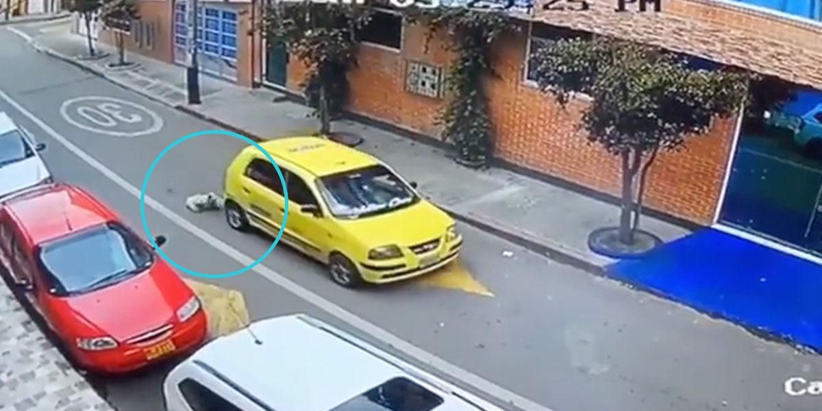 (Video) Buscan al conductor de un taxi que atropelló a una perrita en Bogotá