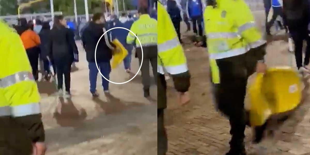 Captan a hincha de Millonarios “robando” una silla del estadio El Campín: policía lo tuvo que perseguir